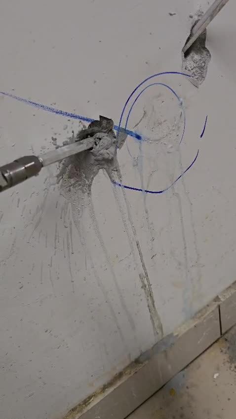Resin injection through a nozzle into a wall crack — SD Aqua Proof project